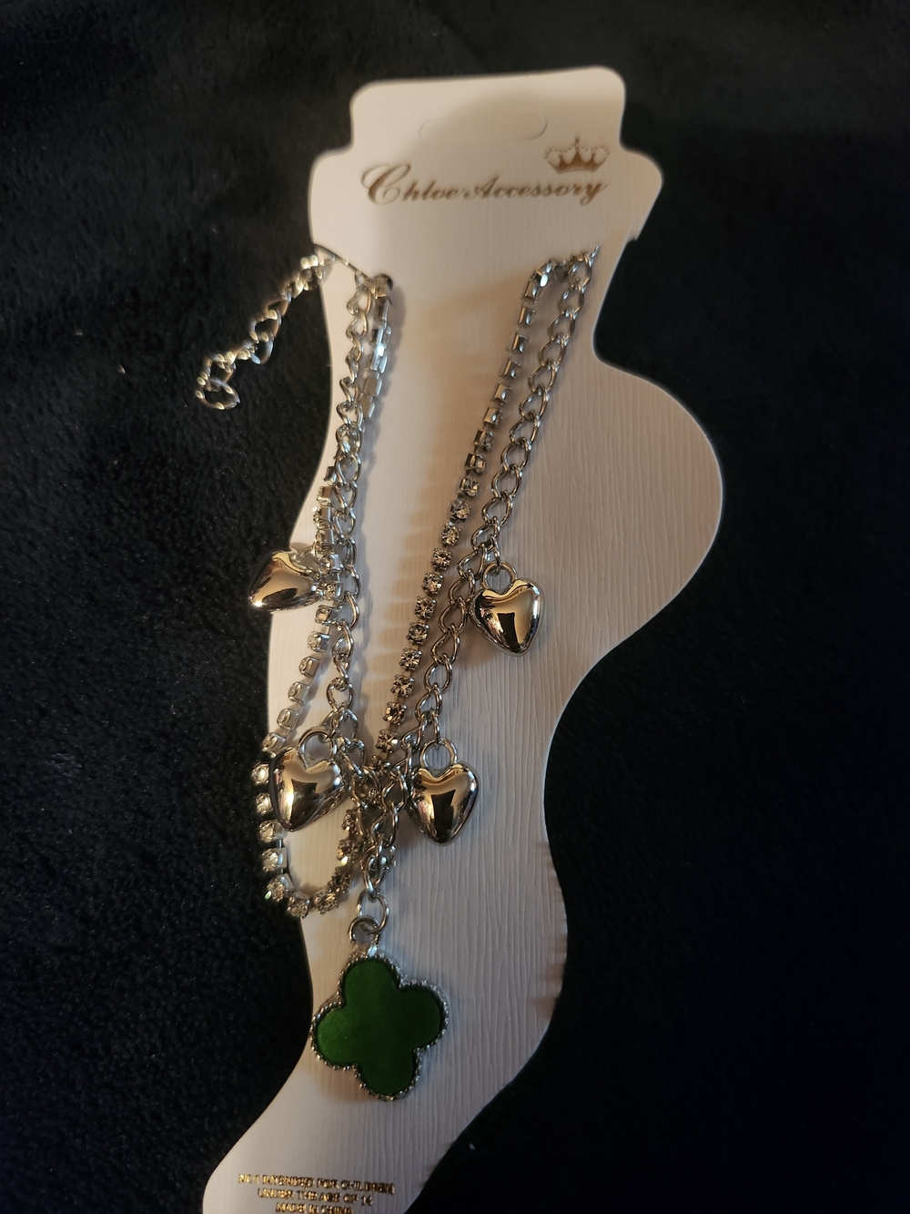 Chloe Silver-Tone Bracelet with Green Clover Charm and Heart Charms
